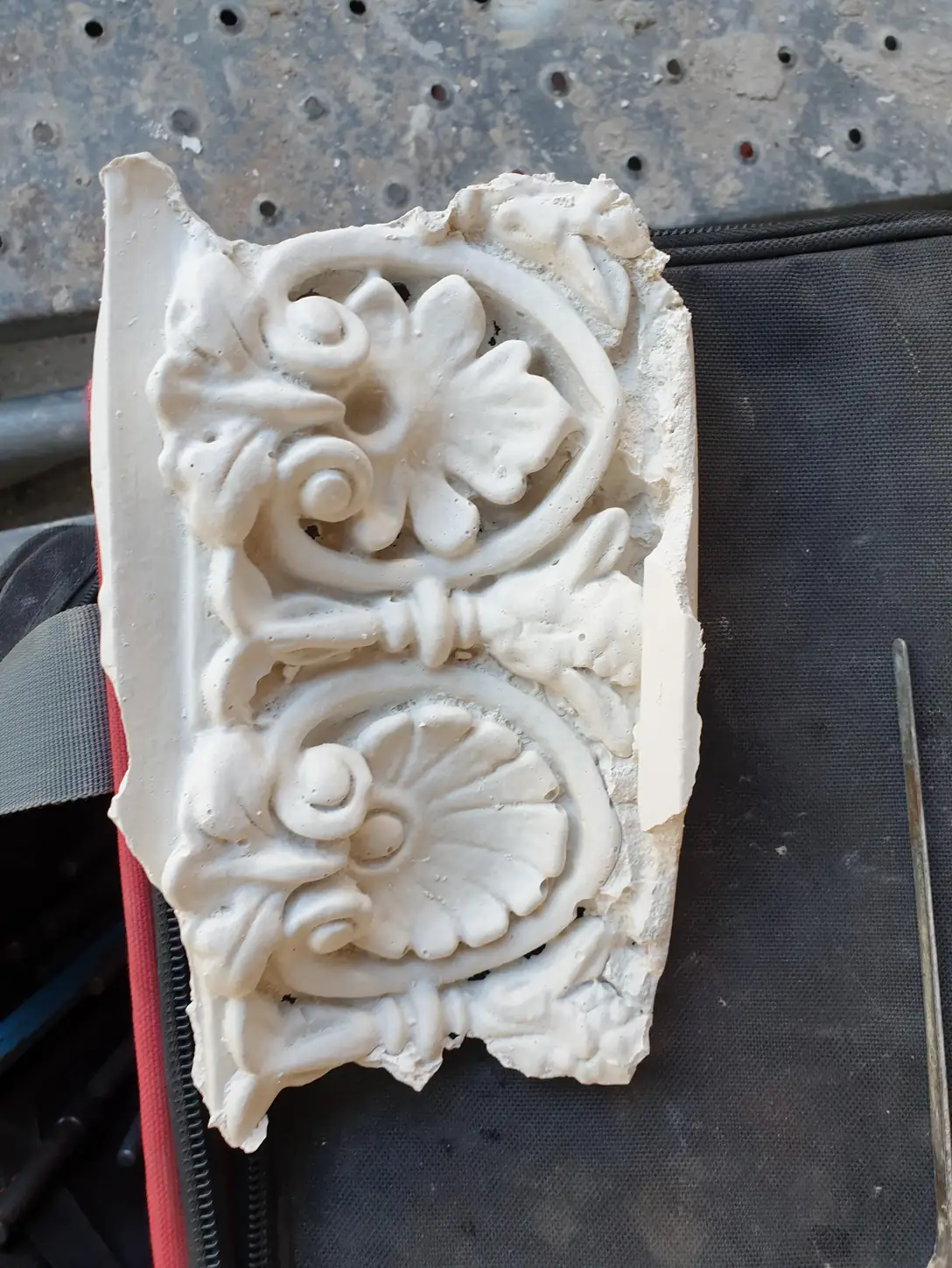 Cast ornamental plaster enrichment with acanthus scroll and shell motif